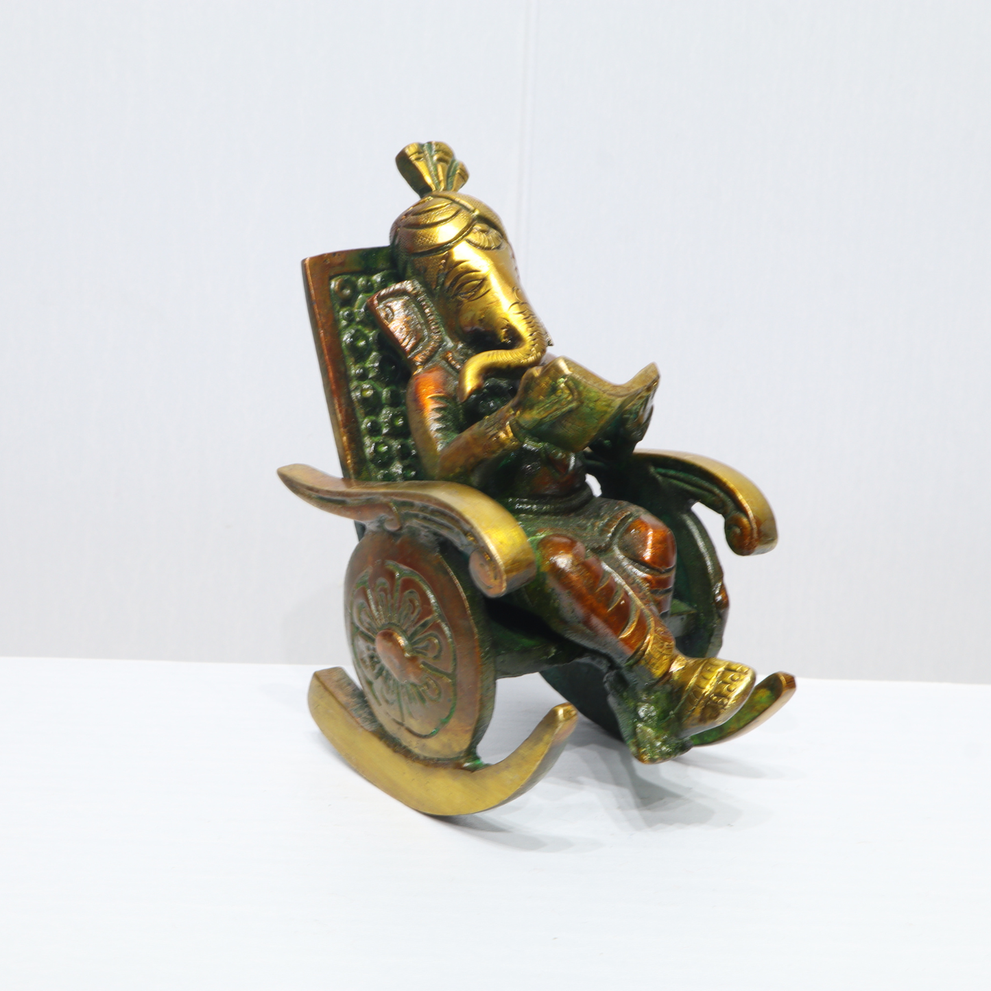 Handcrafted Brass Lord Ganesha Rocking Chair Idol – Auspicious Home Décor & Gift