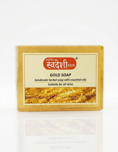 Gold soap bar with a Swadeshi label on a white background