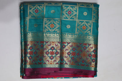 Teal Blue Woven Silk Saree with Traditional Gold Zari Motifs & Contrast Border
