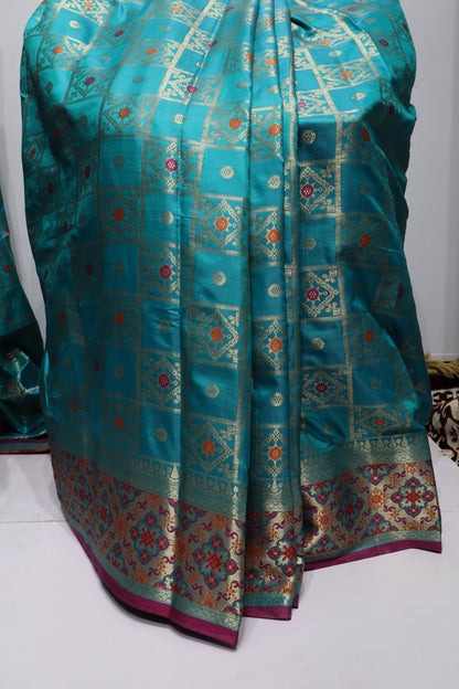 Teal Blue Woven Silk Saree with Traditional Gold Zari Motifs & Contrast Border