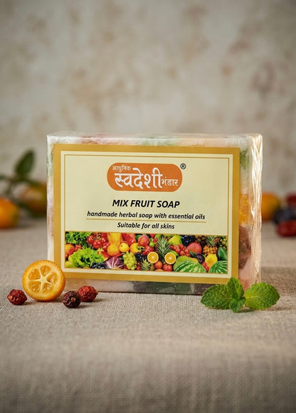 Packaged mix fruit soap with herbs and fruits on a textured surface