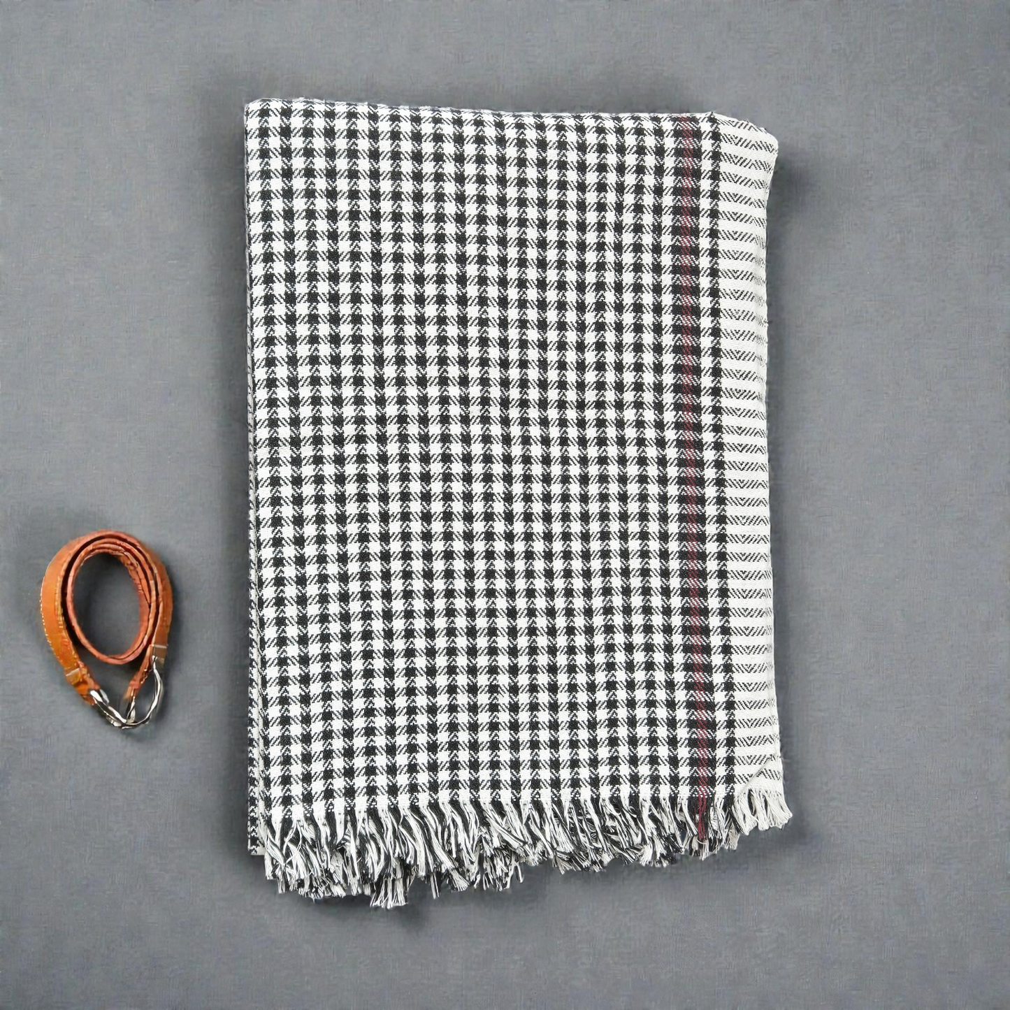 Folded black white handwoven khadi cotton khesh with tassel detailing