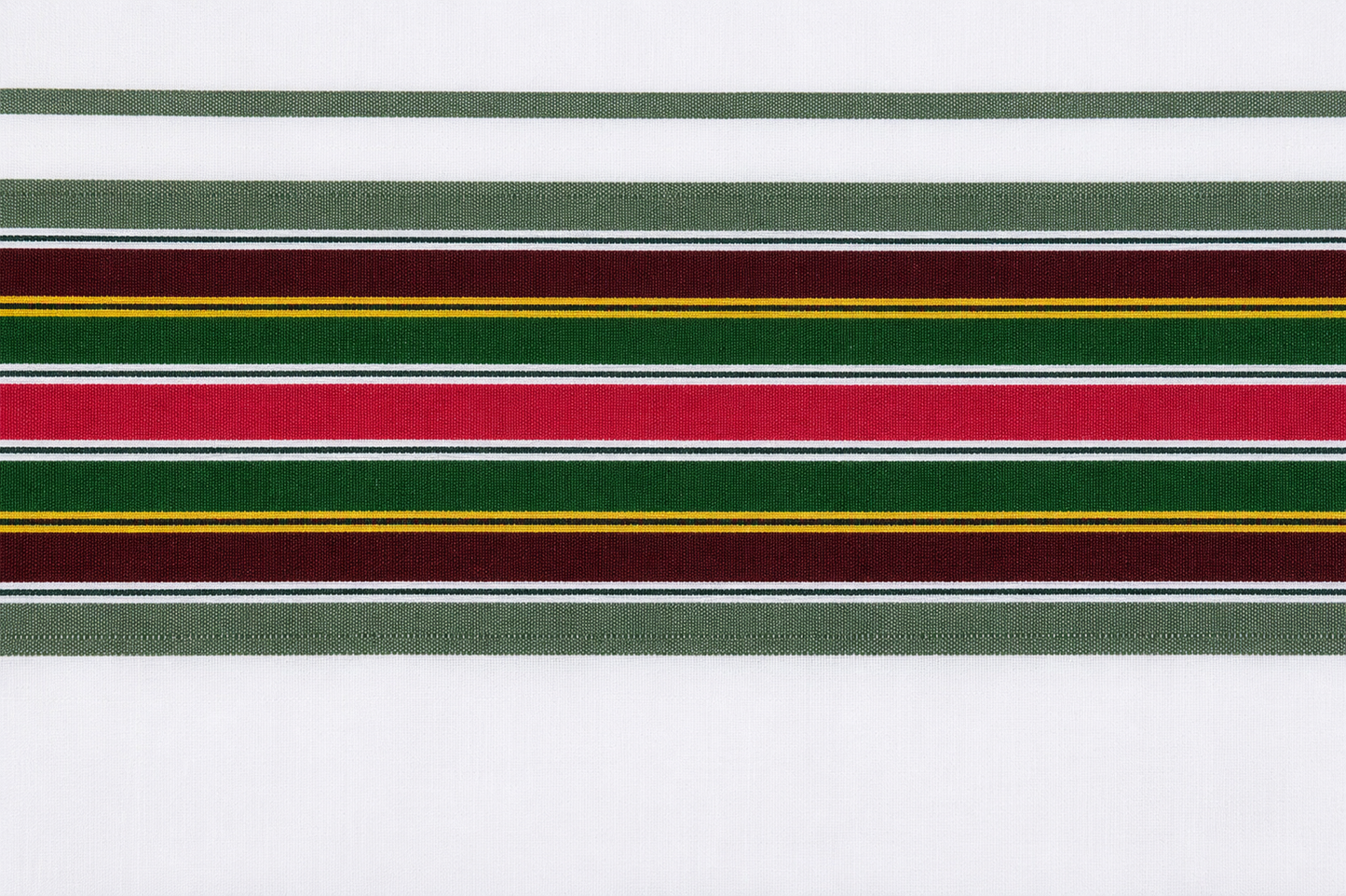 Close-up view of traditional colorful border design on white cotton dhoti fabric