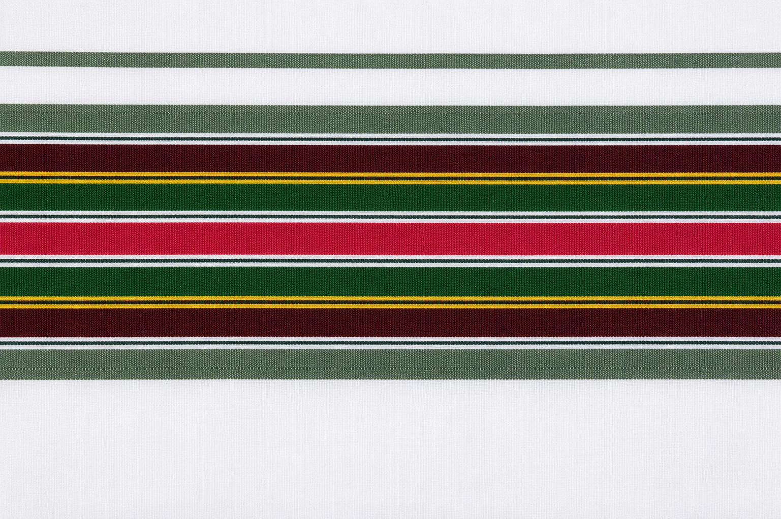 Close-up view of traditional colorful border design on white cotton dhoti fabric