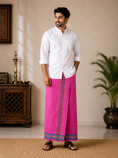 Model wearing premium pink khadi cotton dhoti with purple stripe and multi-color border