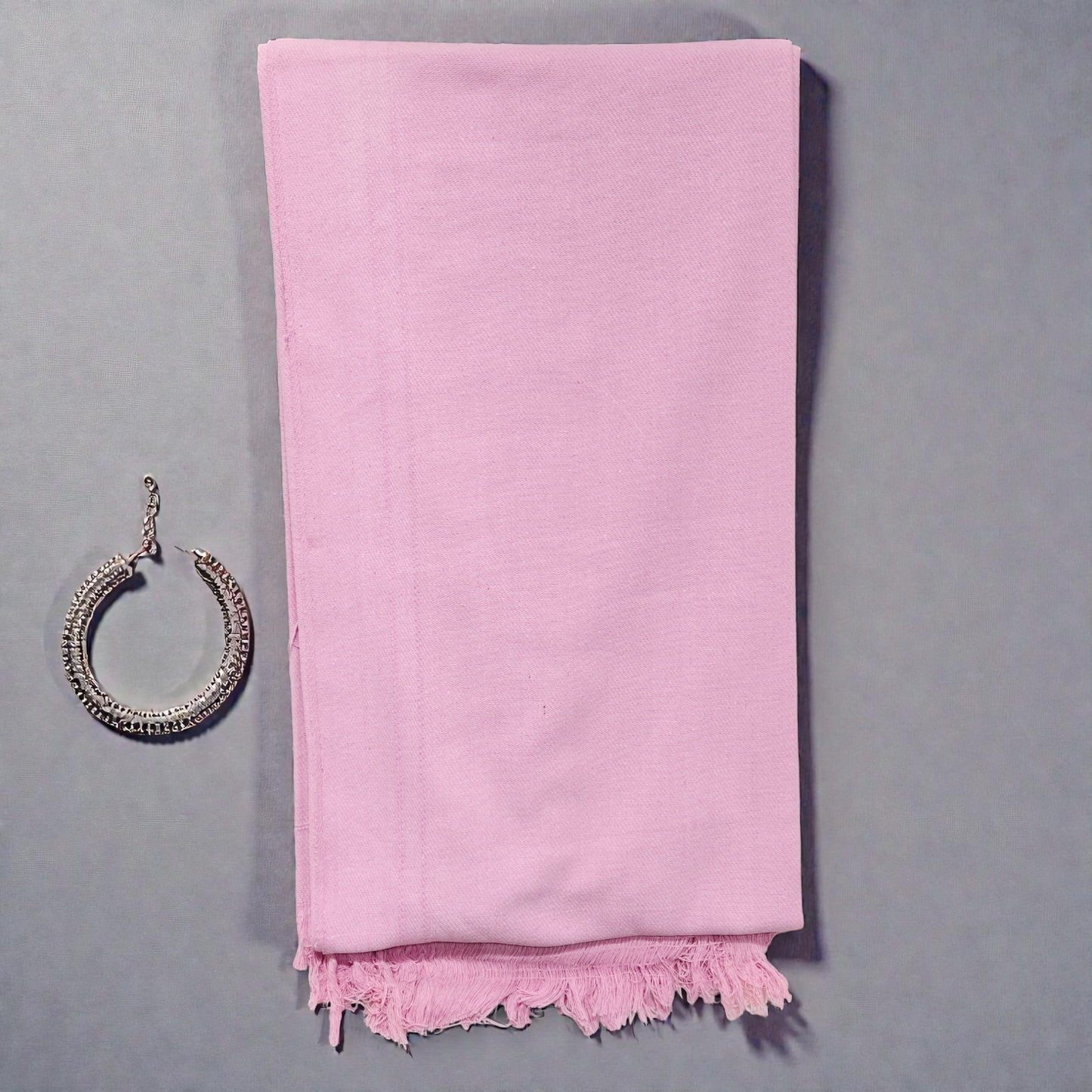 Full view of pink khadi cotton khesh with fringes and handwoven texture