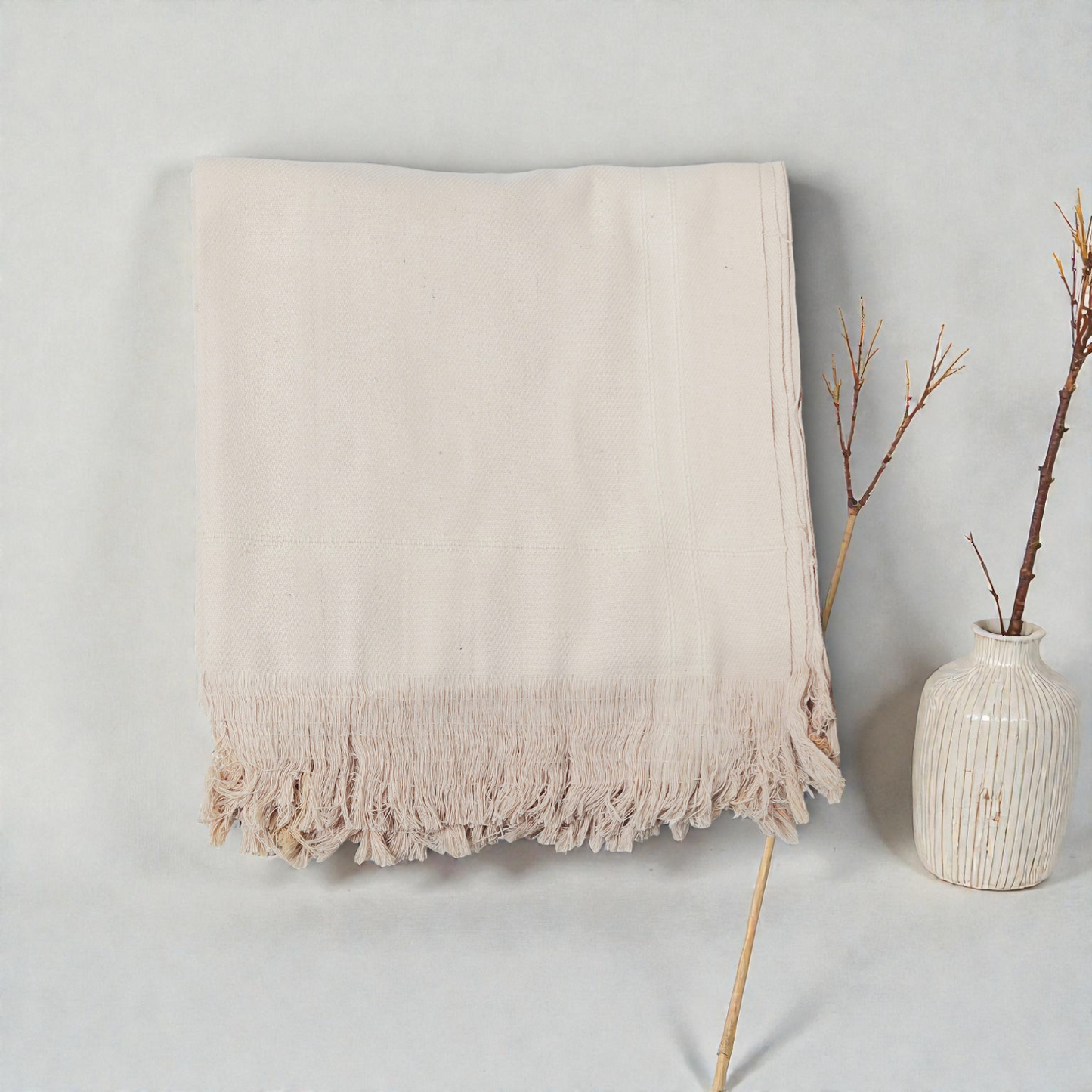 Solid beige khadi cotton khesh handwoven heavy cotton blanket with fringes