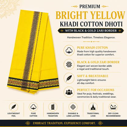 Folded bright yellow khadi cotton dhoti with black and gold woven zari border